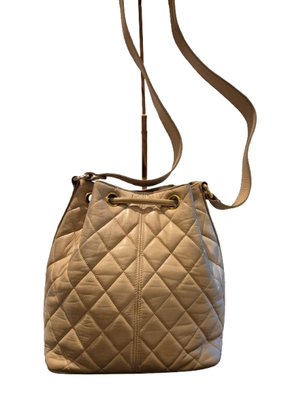 CHANEL beige quilted lamb leather hobo bucket shoulder bag with CC golden drawstrings and pouch