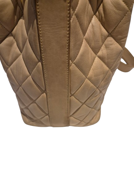 CHANEL beige quilted lamb leather hobo bucket shoulder bag with CC golden drawstrings and pouch