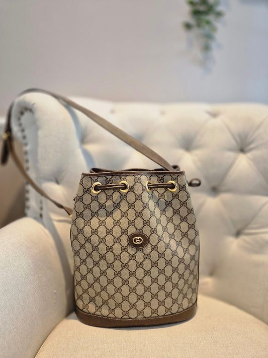 Gucci GG Monogram Womens Drawstring Bucket Bag in PVC Leather