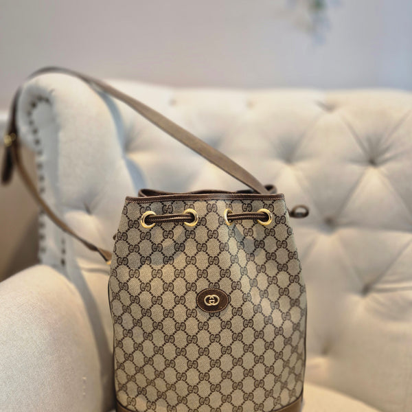 Gucci GG Monogram Womens Drawstring Bucket Bag in PVC Leather