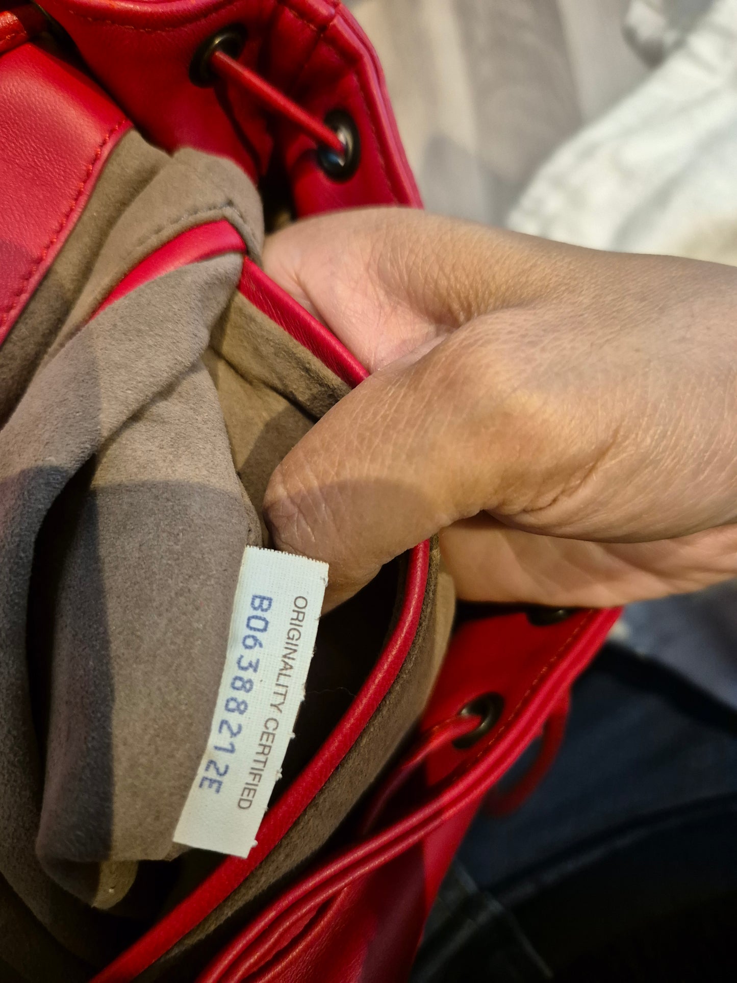 Bottega Veneta Red Leather Intrecciato Flap Drawstring Backpack