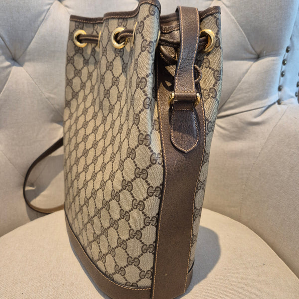 Gucci GG Monogram Womens Drawstring Bucket Bag in PVC Leather