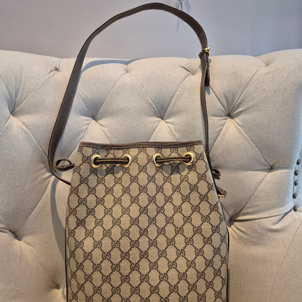 Gucci GG Monogram Womens Drawstring Bucket Bag in PVC Leather